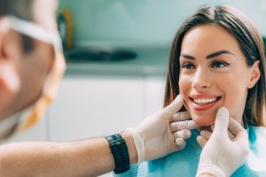 Dentist working on patient during appointment