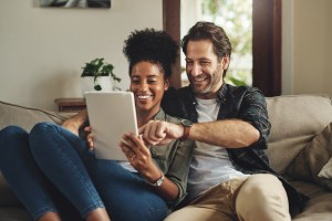 Smiling couple on the sofa