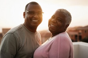 Happy couple in the sunset